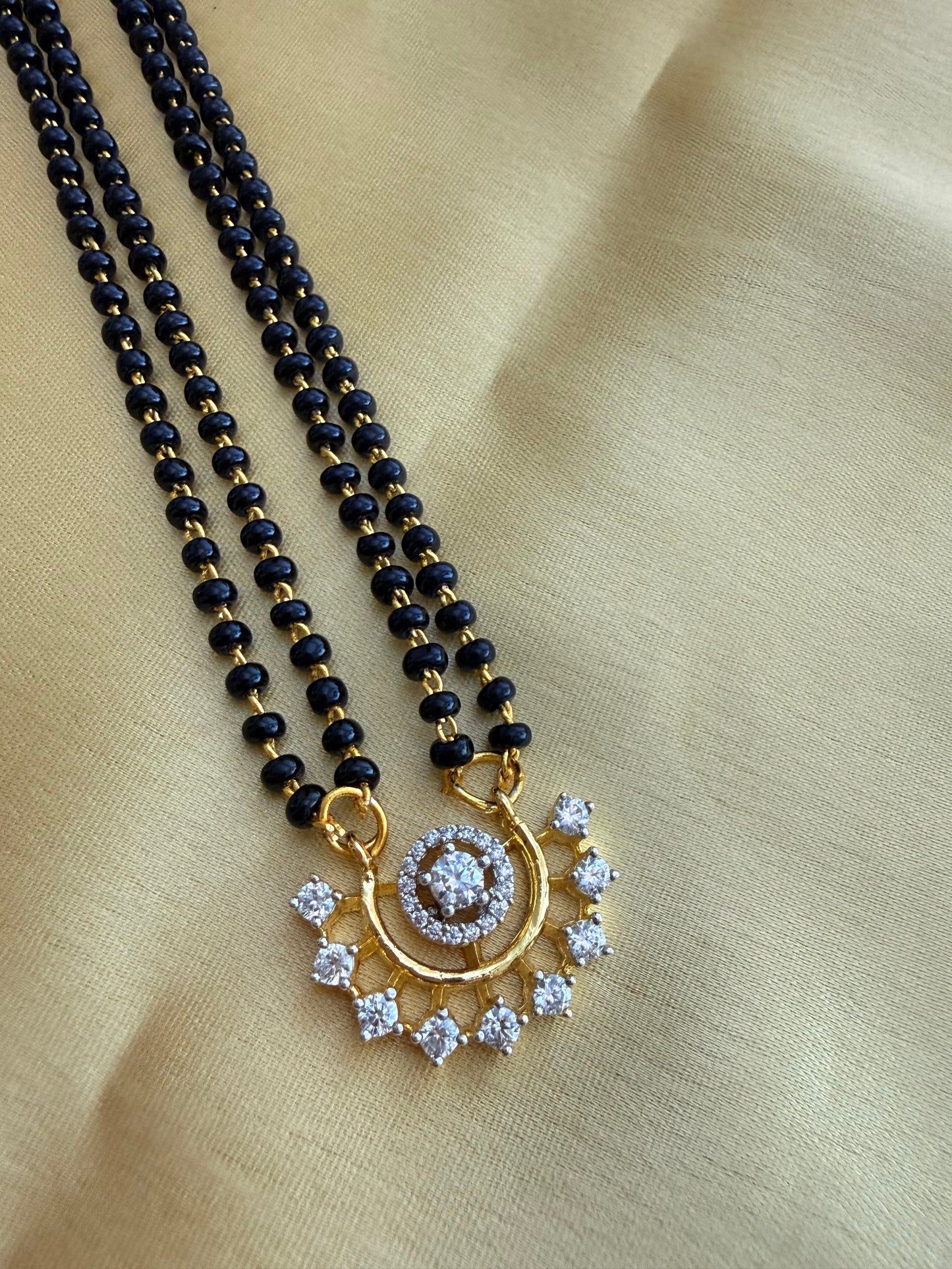 Designer Mangalsutra with matching Earings
