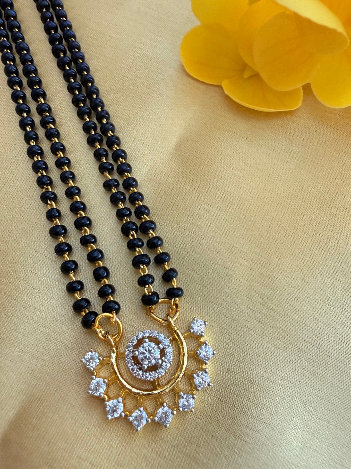 Designer Mangalsutra with matching Earings