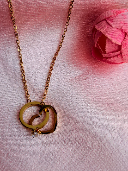 Interlocking heart and ring (solitaire) pendant